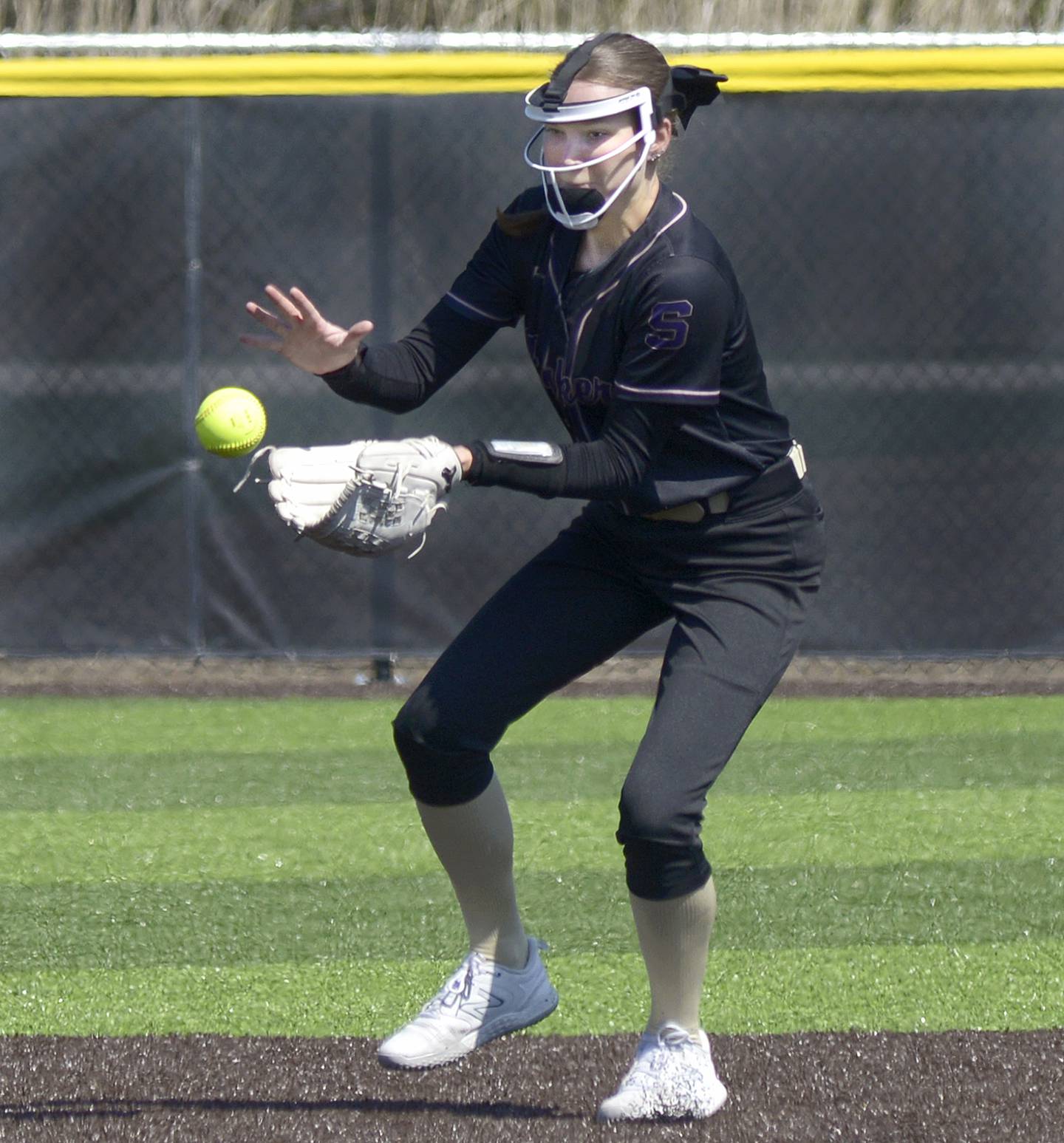 Serena’s Jenna Setchell fields a high hop ground ball against Seneca Saturday at Seneca.