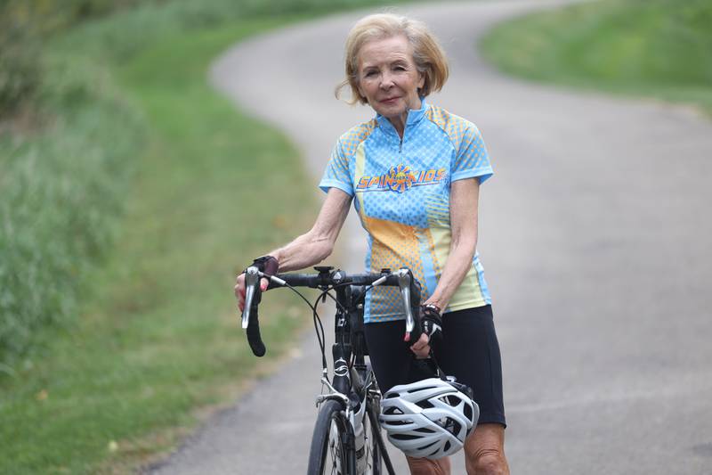 Beverly Voyce stands with her bike on Friday, Sept. 23, 2022, in Joliet. Voyce is going to Atlanta, Georgia in October to cycle 30 miles in a fundraiser in memory of her granddaughter who died in 2004 from neuroblastoma.