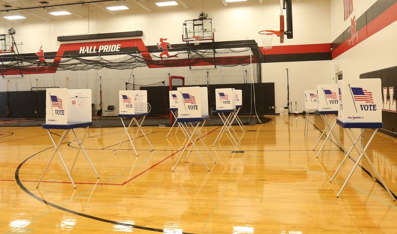 Empty voter booths fill the auxiliary gymnasium on Tuesday, April 1, 2025 at Hall High School in Spring Valley. The City of Spring Valley has a mayor race between Debra L. Perino and incumbent Melanie Malooley Thompson.
