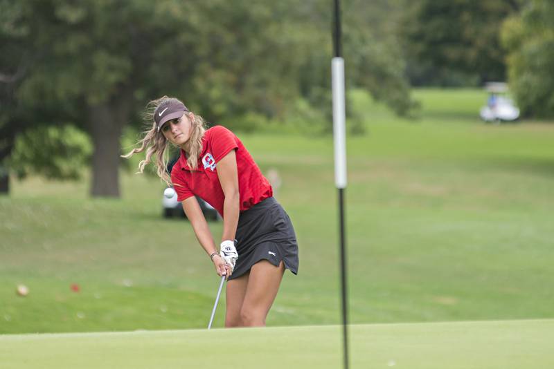 Oregon's Ava Hackman chips onto the green at #3 during the girls class A sectionals Monday, Oct. 4, 2021 at Kewanee Dunes.