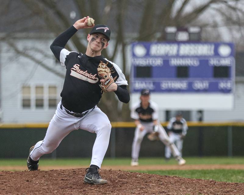 Sandwich's Griffin Somlock (27) delivers to the plate during baseball game between Sandwich at Plano on Thursday, April 9, 2025 in Plano.