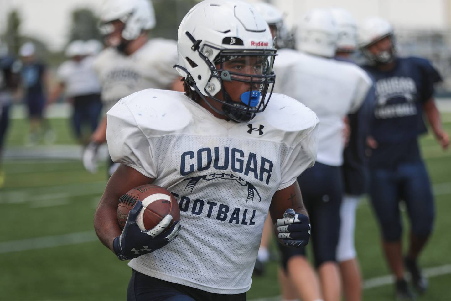 Plainfield South running back Brian Stanton carries the ball during practice on Wednesday, Aug. 18, 2021, at Plainfield South High School in Plainfield, Ill.