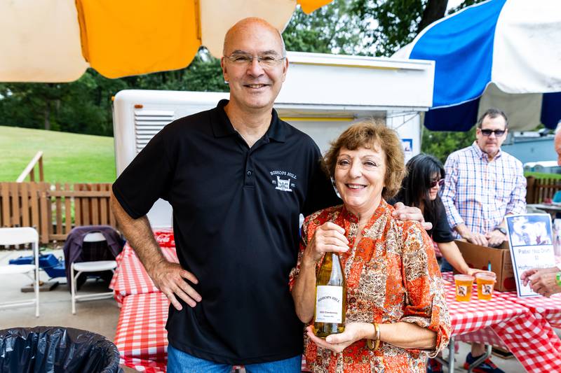 Joliet-based Bishops Hill Wine owner Damon Zdunich and wine connoisseur Rita Slattery enjoy the Slovenian Grape Harvest Festival on Sept. 29, 2024.