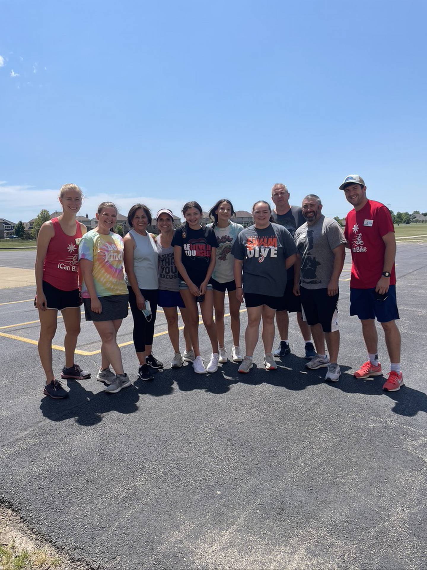 Pictured are Kaitlyn Schmidt from iCan Shine, volunteer Megan Horsch, volunteer Monica Marquez Nelson, volunteer Julie Belka, volunteer Valentina Lagunas, volunteer Audrey Belka, volunteer Mackenzie Rokoczy, volunteer Mike Rokoczy, Supervisor Fred Manzi, and Connor Maguder from iCan Shine at the 
The iCan Bike program. This program teaches people with disabilities ages 8 and up to ride a conventional two-wheel bike. It was held June 14 to June 18, 2021, at Spencer Crossing School in New Lenox.
