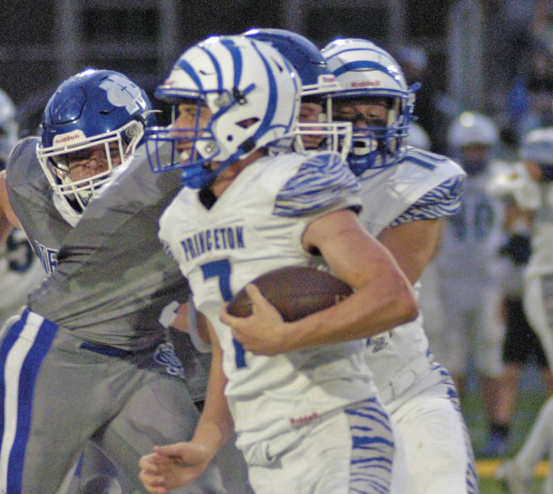 Princeton's  Gavin Lanham turns upfield against Newman. Newman Central Catholic H.S hosted Princeton H.S. in a non-conference football game at Sterling H.S, on Friday, August 29, 2025.