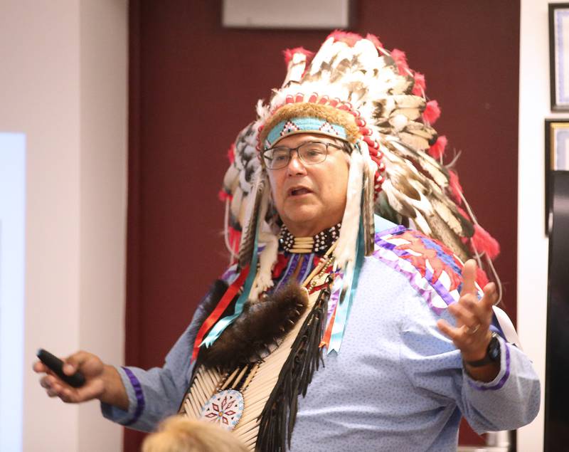 Gerald Savage, a tribal elder with the Ho-Chunk Nation, speaks during a program on Monday, Aug. 4, at the Richard A. Mautino Memorial Library in Spring Valley. Chief Savage spoke to about 40 people about the history of the Ho-Chunk Tribe, Native American instruments, stories and more. Chief Savage is an Illinois Humanities Road Scholar who speaks across the State and Wisconsin.
