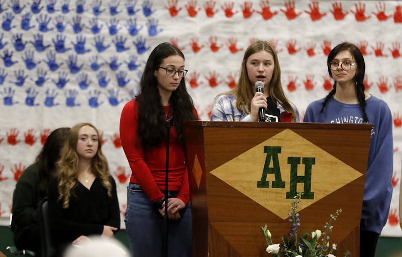 Alden-Hebron High School senior Jessica Webber, junior Raleigh Gaddini, and senior Evelyn Heber recite “In Flanders Field” during the Veterans Day ceremony Wednesday, Nov.8, 2023, at Alden-Hebron High School in Hebron.