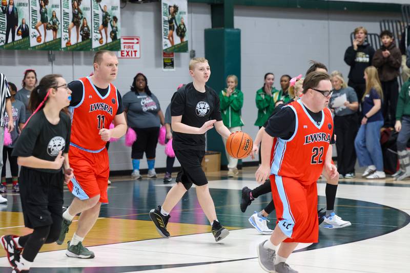 River Valley Special Rec player Ian Greene dribbles the ball up the court in their game against Lincolnway Special Recreation Association at Bishop McNamara on Friday, Jan. 30, 2026.