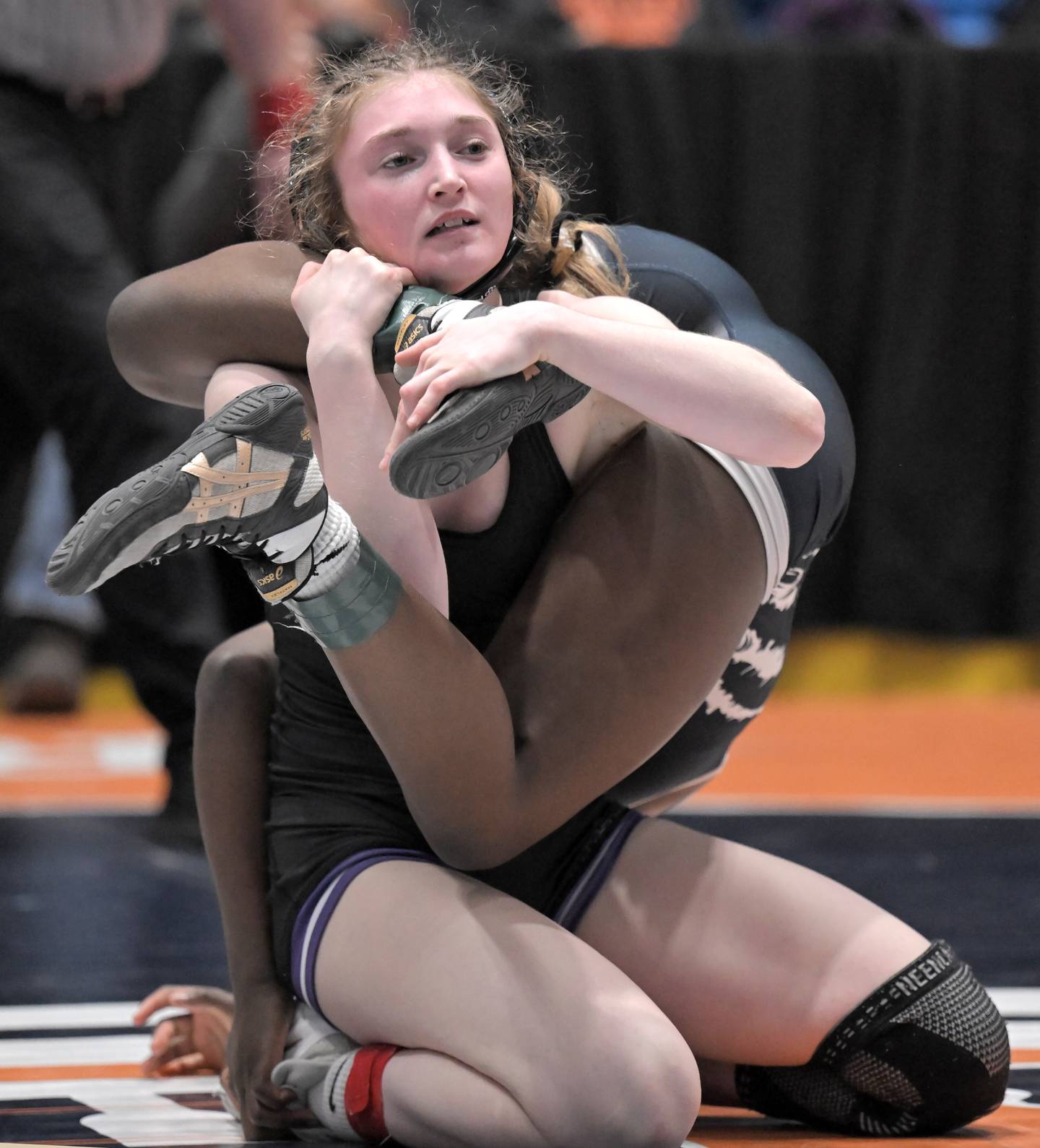 Hampshire’s Stella Piazza tangles with Chicago Hope’s Demitria Griffin in the 115-pound class at the girls wrestling state finals tournament at Grossinger Arena in Bloomington on Saturday, Feb. 28, 2026.