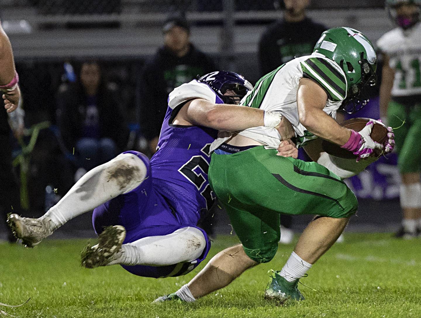 Dixon’s Aiden Wiseman hauls down North Boone’s Connor McKibben Friday, Oct. 20, 2023 in Dixon.