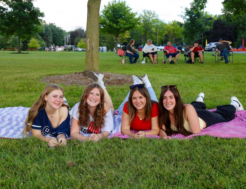 (Left to right) Emma Ziemba, Delaney Raferty, Emily, Chiappini and Allyson Chiappini wait for the Elburn Lions Club’s Fireworks Show to begin  on Saturday, July 12, 2025 in Elburn.