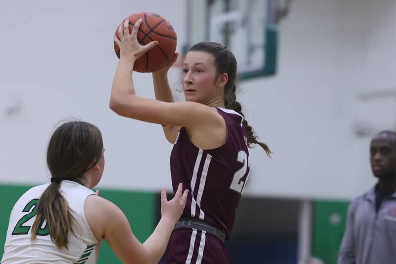 Lockport’s Kara Osinski looks to pass against Providence.