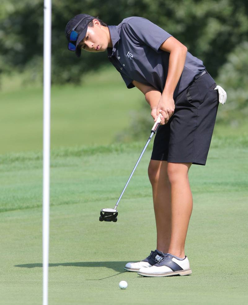 Sycamore’s Matthew Loos putts on the eighteenth green during the Mark Rolfing Cup Monday, Aug. 21, 2023, at the Kishwaukee Country Club in DeKalb.