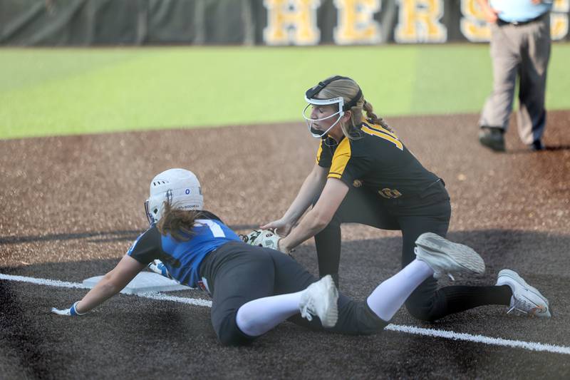 Herscher's Addy Whitaker puts the tag on Central's Blair Bottorff for an out during the Tigers' 13-6 victory against Central on Wednesday, May 14, 2025.