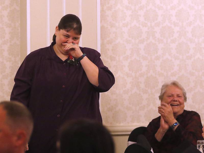 Renae St. Clair of Huntley High School reacts to winning the 2023 Educator of the Year award during the the Educator of the Year Dinner, Saturday, May 6, 2023, at Hickory Hall, in Crystal Lake. The annual awards recognize McHenry County’s top teachers, administrators and support staff.
