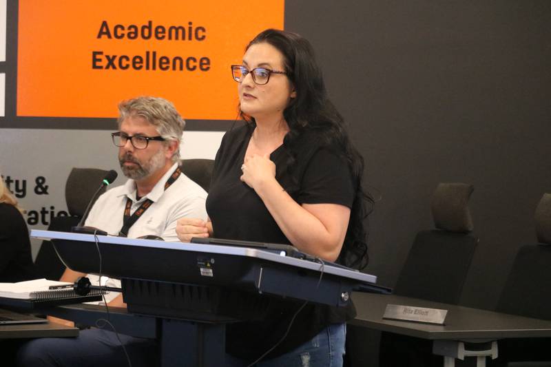 DeKalb resident Lina Harris speaks out Sept. 17, 2024, during a meeting of the DeKalb School District 428 Board of Education.