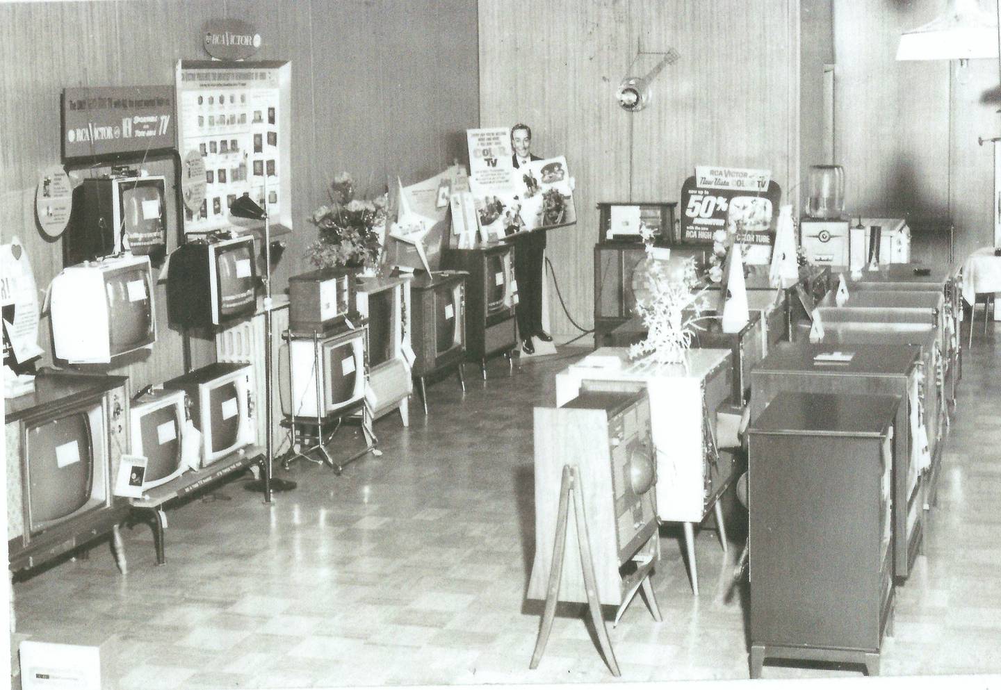 John Lucenta Sr. started Lucenta Tire in Will County 75 years ago, after coming to the U.S. from Italy as a boy not knowing how to speak English. The last of its six locations closed for good on May 25 due to high rent. Pictured is the TV showroom  in the 1950s.