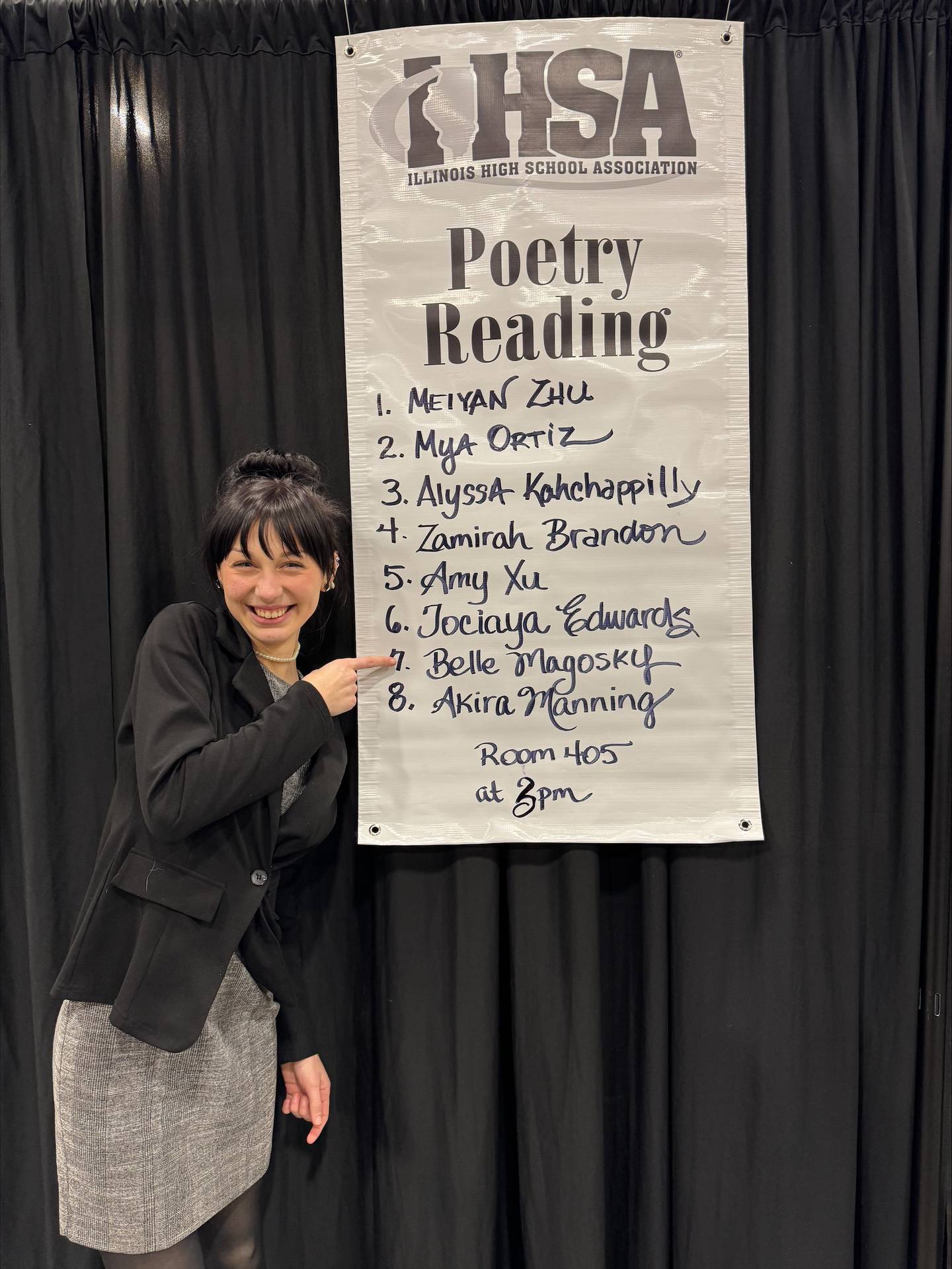Belle Magosky stands by the poster announcing she had qualified for the final round of Poetry Reading at the State Speech Competition in Peoria.
Feb. 23, 2025