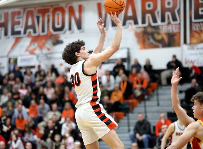 Wheaton Warrenville South's Luca Carbonaro shoots three points during a game against Batavia on Friday, Feb. 14, 2025 in Wheaton.