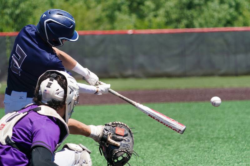 Oswego East's Andrew Lewis (2) singles against Downers Grove North during a 4A Bolingbrook Regional Championship baseball game at Bolingbrook High School on Saturday, May 25, 2024.