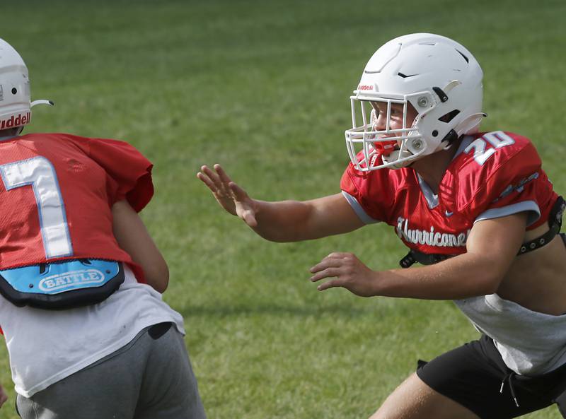 Marian Central’s Mike Schmid plays pass defense against Josh Gawronski during football practice on Tuesday, August 19, 2025, at Marian Central  High School in Woodstock.