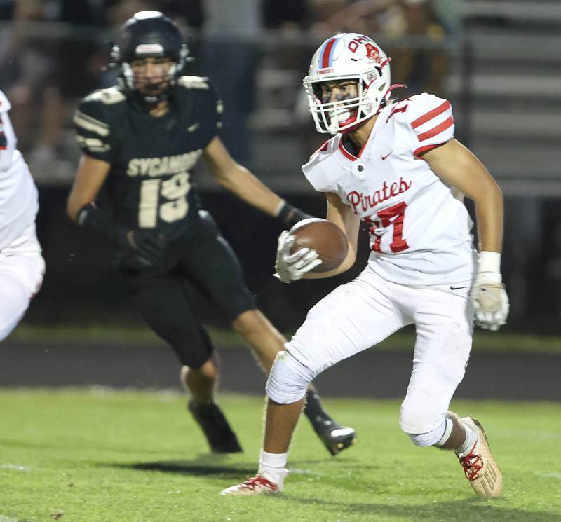 Ottawa's Julian Alexander looks for running room in the Sycamore kickoff return coverage during their game Friday, Sept. 16, 2022, at Sycamore High School.
