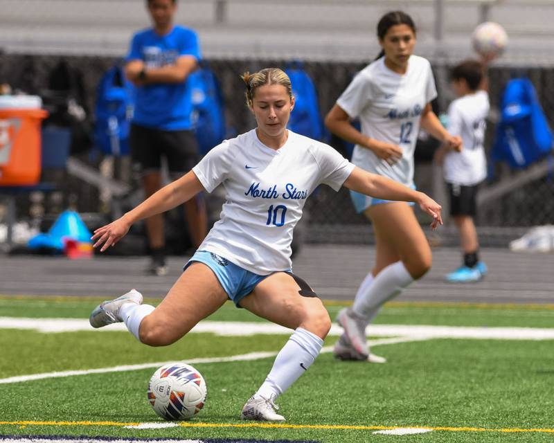 St. Charles North Sophie Kreten (10) kicks the ball up the field while taking on St. Charles East on Saturday May 27th for the regional title game.