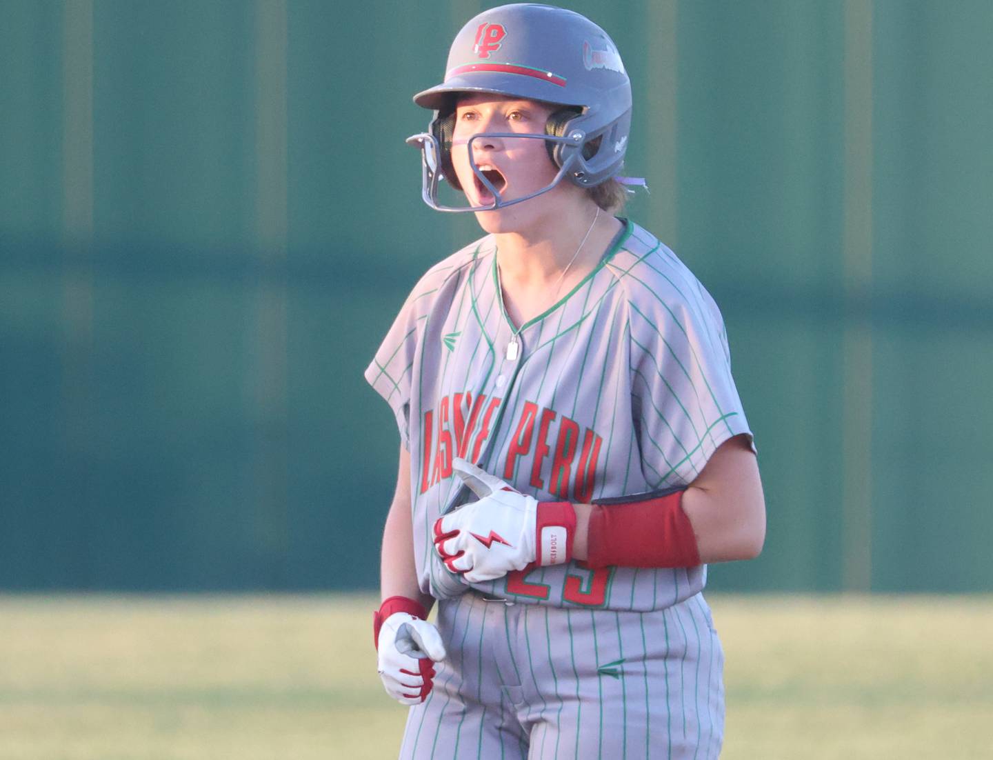 L-P's Mackenzie Chamberlin reacts while standing on second base after hitting a RBI double during the Class 3A Sectional semifinal game on Tuesday, May 26, 2026 at the L-P Athletic Complex in La Salle.
