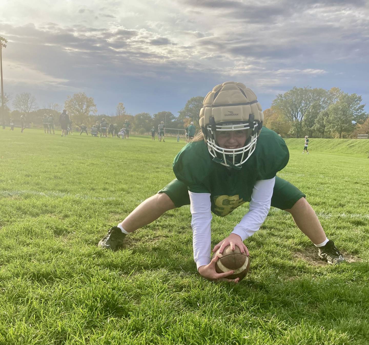 Senior long snapper Marly Tillman prepares to make a snap during Wednesday's practice at St. Bede. She is one of three girls suiting up for the Bruins this fall.