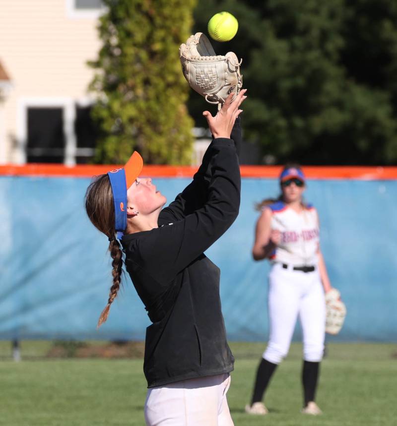 Genoa-Kingston's Olivia Vasak catches a popup Thursday, May 8, 2025, during their game against DeKalb at Genoa-Kingston High School.