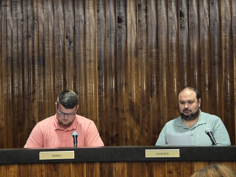Daniel Danko (left) and Scott Scheuer sit on the Streator City Council on Wednesday, May 7, 2025, after being sworn in to succeed Matt McMullen and David "Moose" Conner.