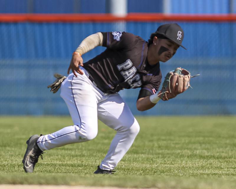 Oswego East's Devin Wheaton (2) catches a popup at second during baseball game Oswego East at Oswego.  May 14, 2026 in Oswego.