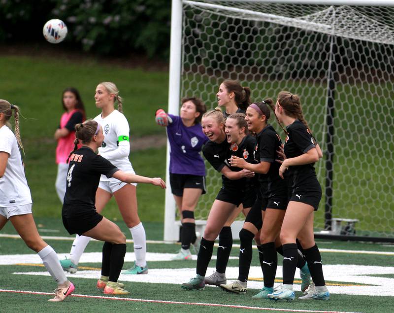 Wheaton Warrenville South players celebrate Ashlyn Adams’ goal during a Class 3A Glenbard West Sectional semifinal game against Glenbard West on Tuesday, May 27, 2025 in Glen Ellyn.