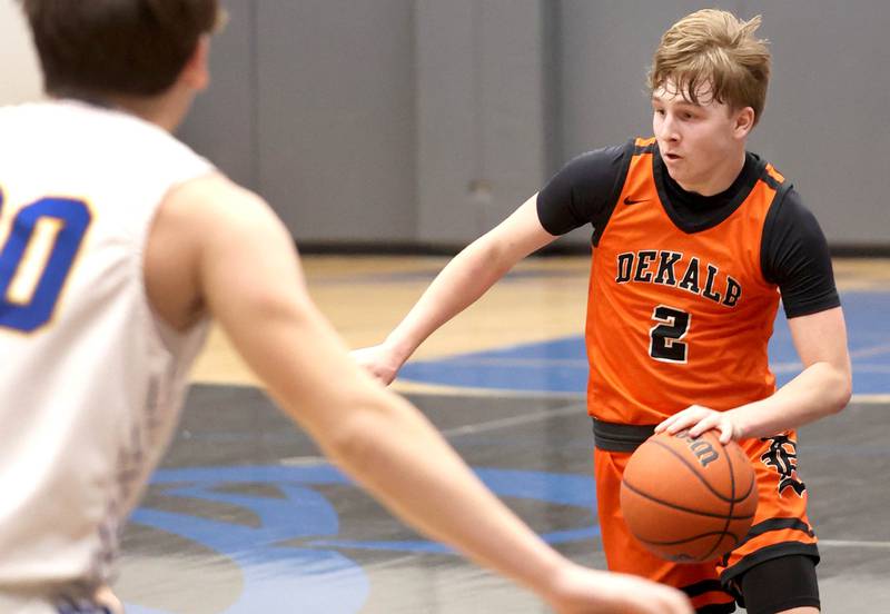 DeKalb’s Sean Reynolds drives through the Lyons Township defense Monday, Jan. 15, 2023, during their game in the Burlington Central Martin Luther King Jr. boys basketball tournament.