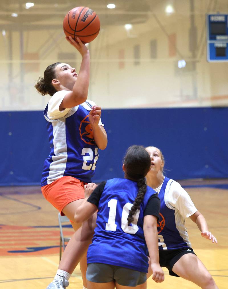 Genoa-Kingston’s Regan Creadon shoots in the lane during a drill Wednesday, June 26, 2024, at summer practice at the school.