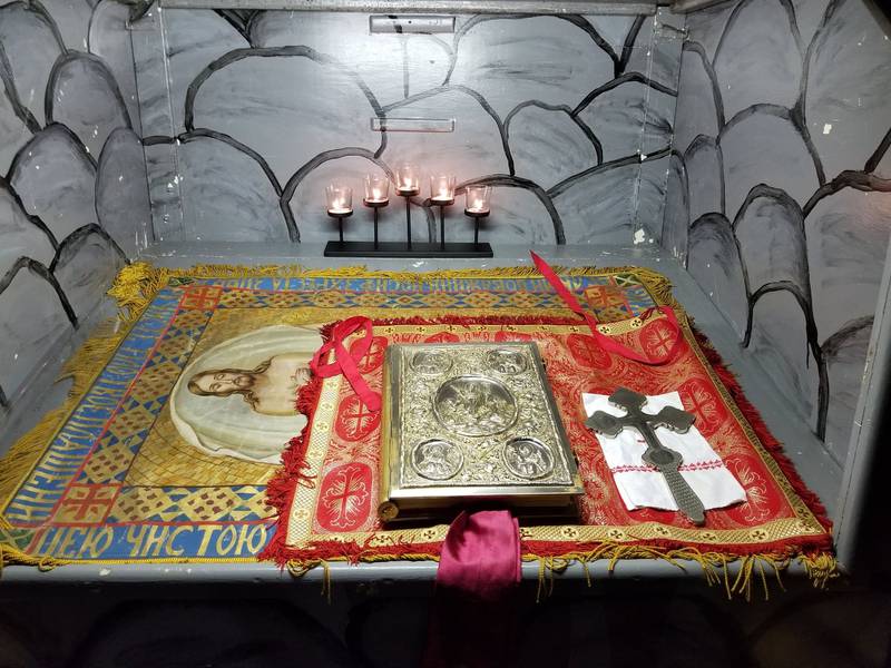 Pictured is the "tomb of Christ" from a pre-pandemic year at St. Nicholas Orthodox Church in Homewood, which is under the Ukrainian Orthodox Church – Kyiv Patriarchate. Some churches keep round-the-clock vigils at the tomb, starting with the end of Good Friday services until matins at midnight on Easter Sunday.
