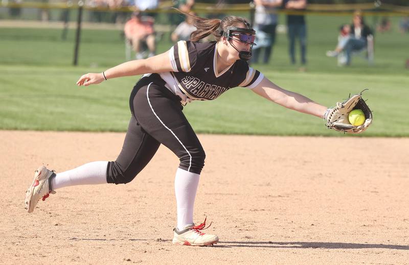 Sycamore's Brooklynn Snodgrass makes a running catch during their game against Morris Wednesday, May 10, 2023, at Sycamore High School.