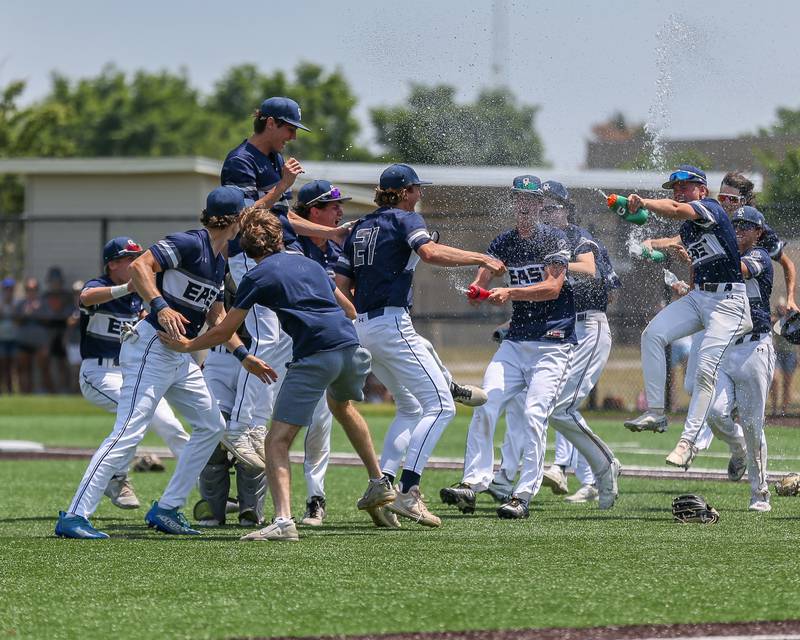Oswego East celebrates the victory over Oswego in their Class 4A Romeoville Sectional final game.  June 3, 2023.