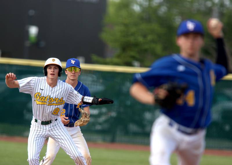 Crystal Lake South’s Drew Watson gets a lead off of second base against Lake Forest in Class 3A baseball regional action at Crystal Lake Thursday.
