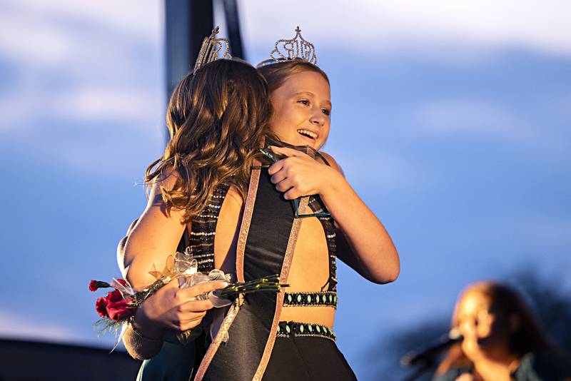 Cylee Kirchner gets a hug Wednesday August 2, 2023 after winning the Junior Miss Ogle County pageant.