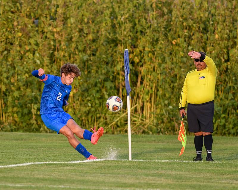 Hinckley-Big Rock's Tyler Smith kicks the ball into play from a corner kick during the first half of the game against Indian Creek held at Hinckley-Big Rock High School on Monday Sept. 26th.