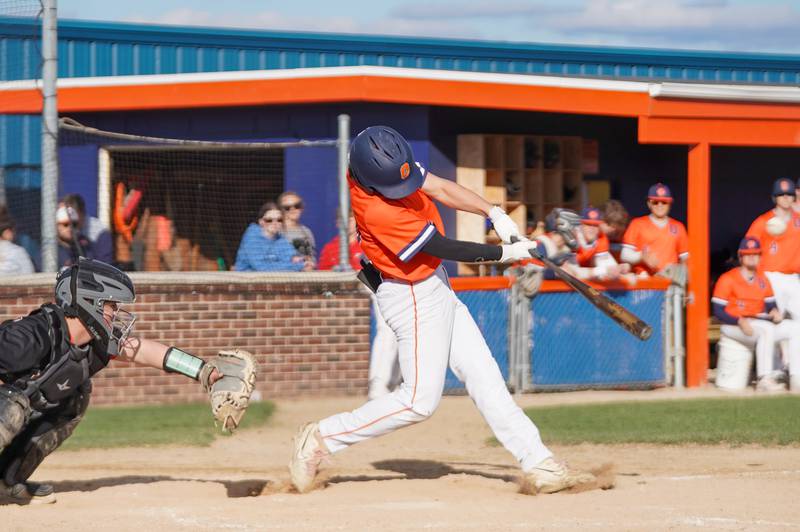 Oswego’s Bryson Norwood (16) hits a two run double against Plainfield East during a baseball game at Oswego High School on Tuesday, April 9, 2024.