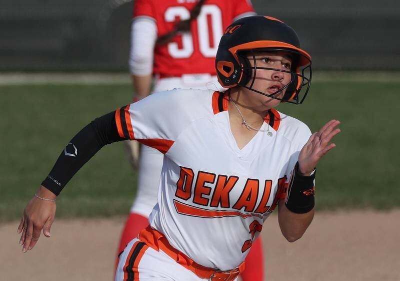 DeKalb's Emma Hart heads for third Wednesday, April 16, 2025, during their game against Naperville Central at DeKalb High School.