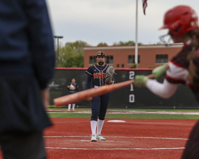Oswego's Adalynn Fugitt (5) looks in at the plate before throwing a pitch during softball game between Oswego at Yorkville. May 5, 2026 in Yorkville.