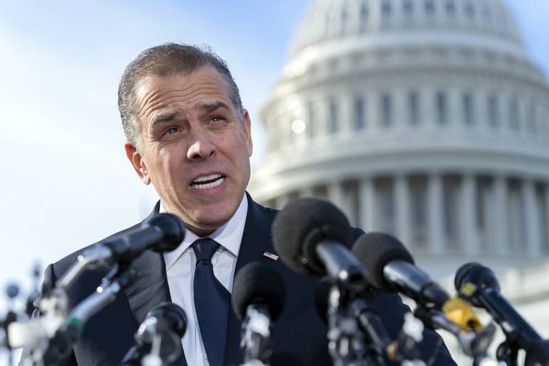 Hunter Biden, son of U.S. President Joe Biden, talks to reporters at the U.S. Capitol, in Washington, Wednesday, Dec. 13, 2023. Hunter Biden lashed out at Republican investigators who have been digging into his business dealings, insisting outside the Capitol he will only testify before a congressional committee in public. (AP Photo/Jose Luis Magana)