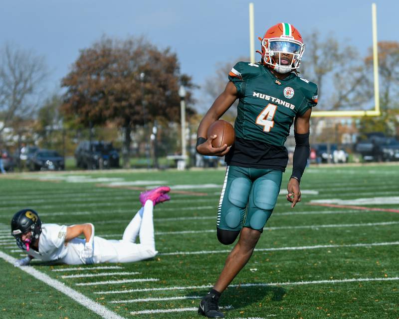 Morgan Park's Marcus Thaxton (4) runs in for a touchdown during the first quarter on Saturday Nov. 4, 2023, while taking on Sycamore at Gately Stadium in Chicago.