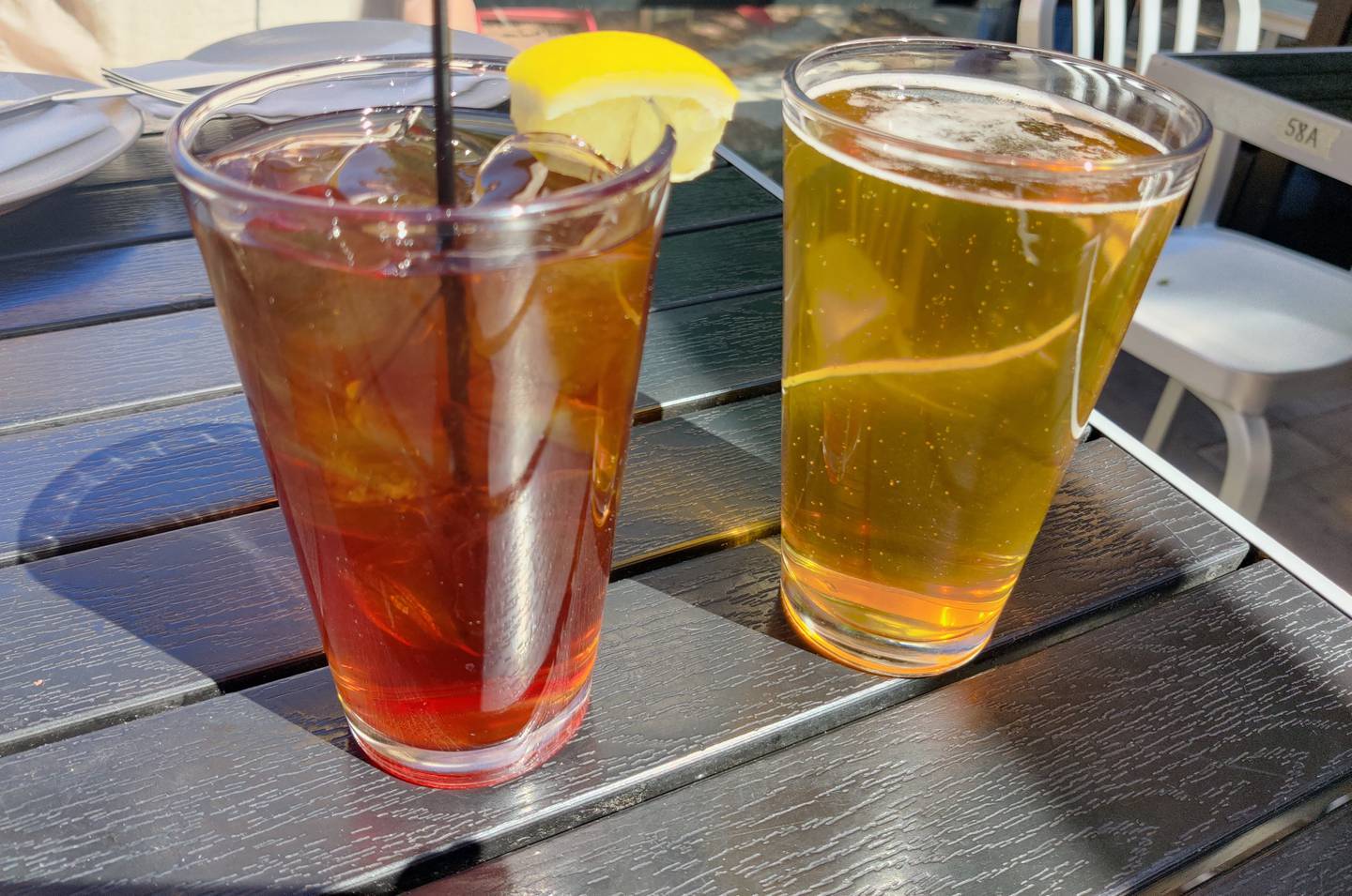 Iced tea and a Geneva-made Penrose Brewing beer at Preservation in Geneva.