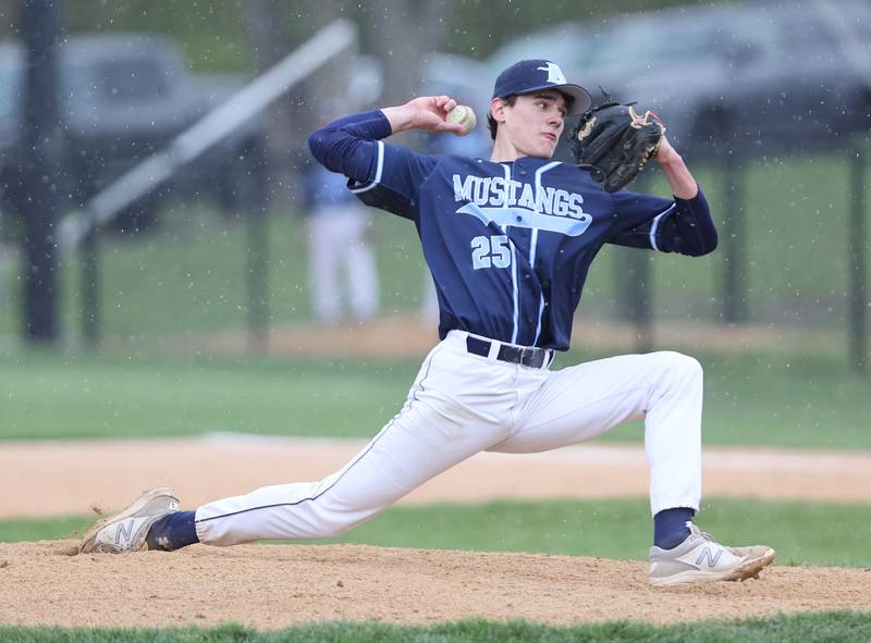 Downers Grove South's Corey Urban (25) pitches during the varsity baseball game between Downers Grove South and Downers Grove North in Downers Grove on Saturday, April 29, 2023.