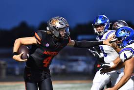 Photos: St. Charles North, Minooka football meet to open season