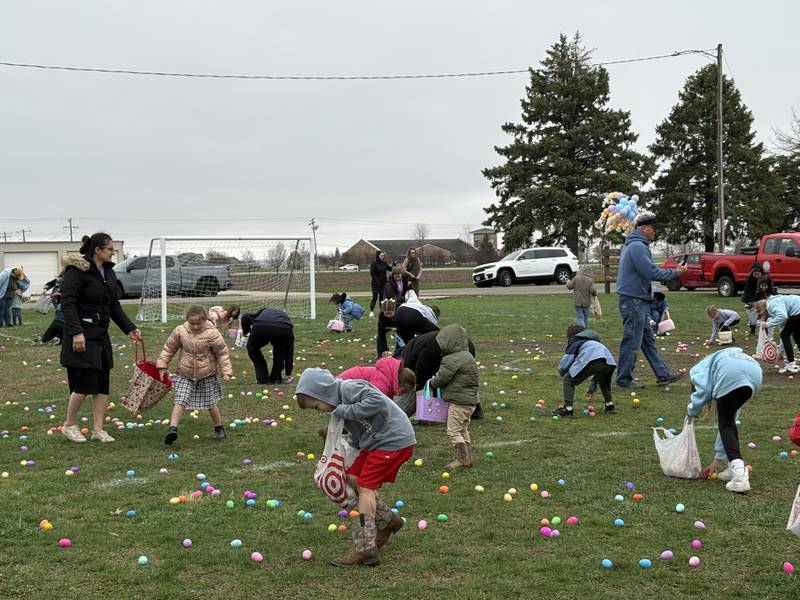 Children swarm the soccer field at Ottawa's Easter Egg Hunt on Saturday, April 4 at Peck Park in Ottawa.